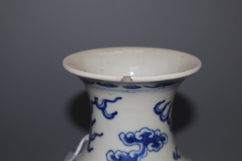 A Chinese blue and white dragon vase, two blue and white vases and a jar, all c.1880-1910, tallest 25.5cm